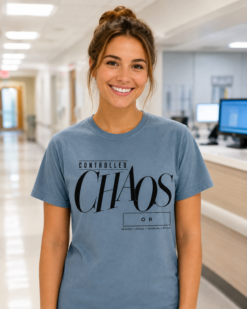 Nurse wearing the Controlled Chaos department tee in Sage