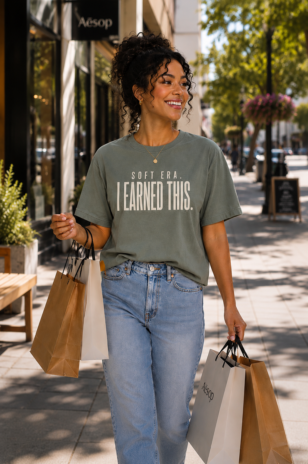 Soft Era I Earned It women's tee styled with casual denim