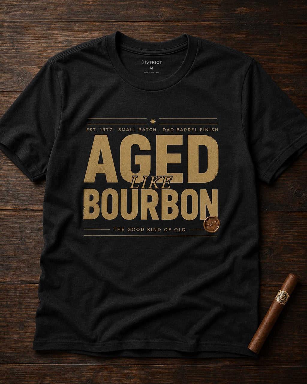 Aged Like Bourbon personalized men's black tee styled on dark wood with cigar