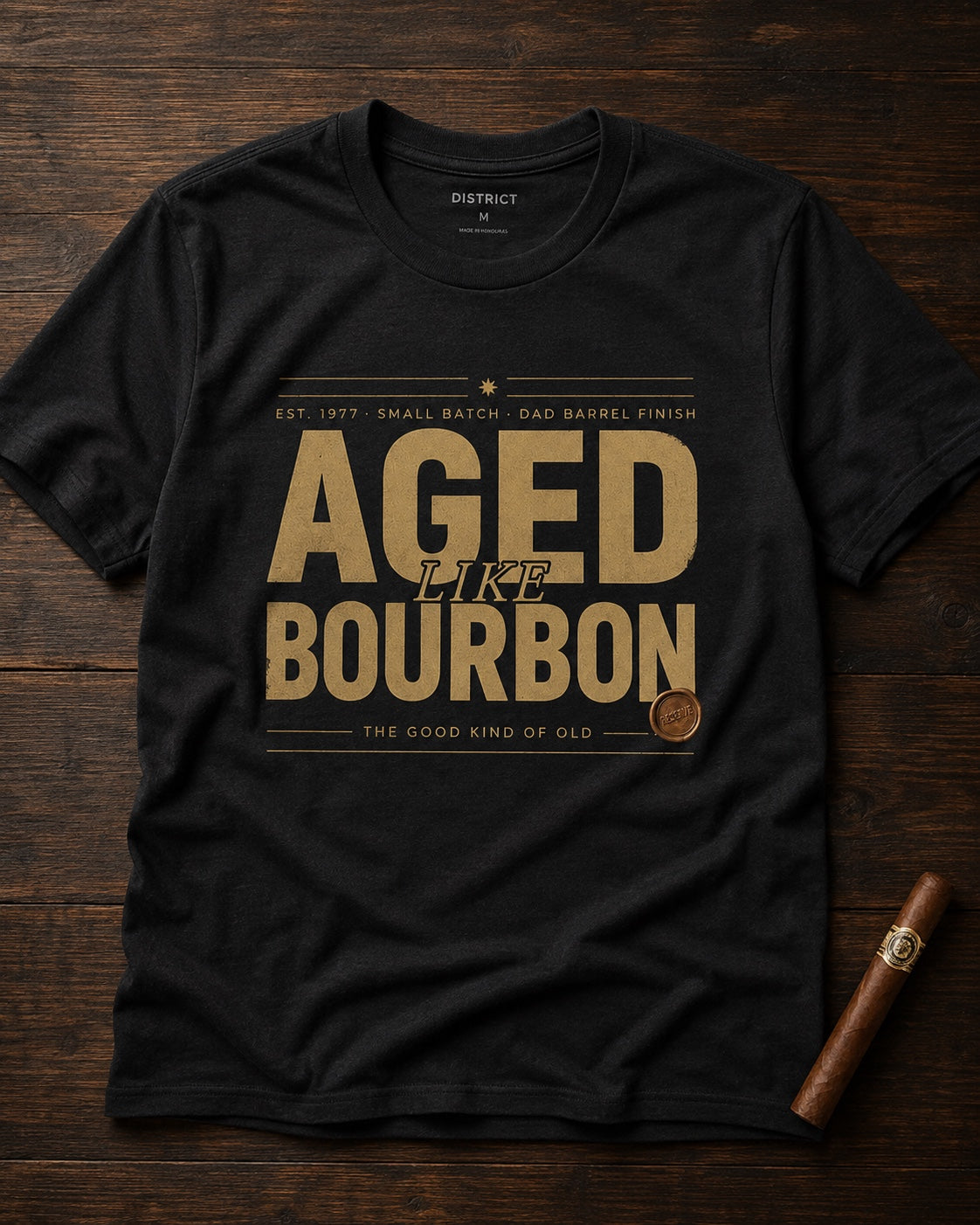 Aged Like Bourbon personalized men's black tee styled on dark wood with cigar