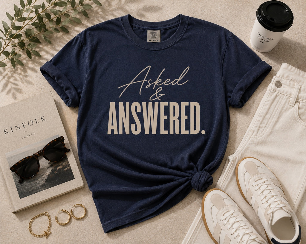 Comfort Colors Midnight Navy Asked & Answered statement tee styled in an editorial flat lay.