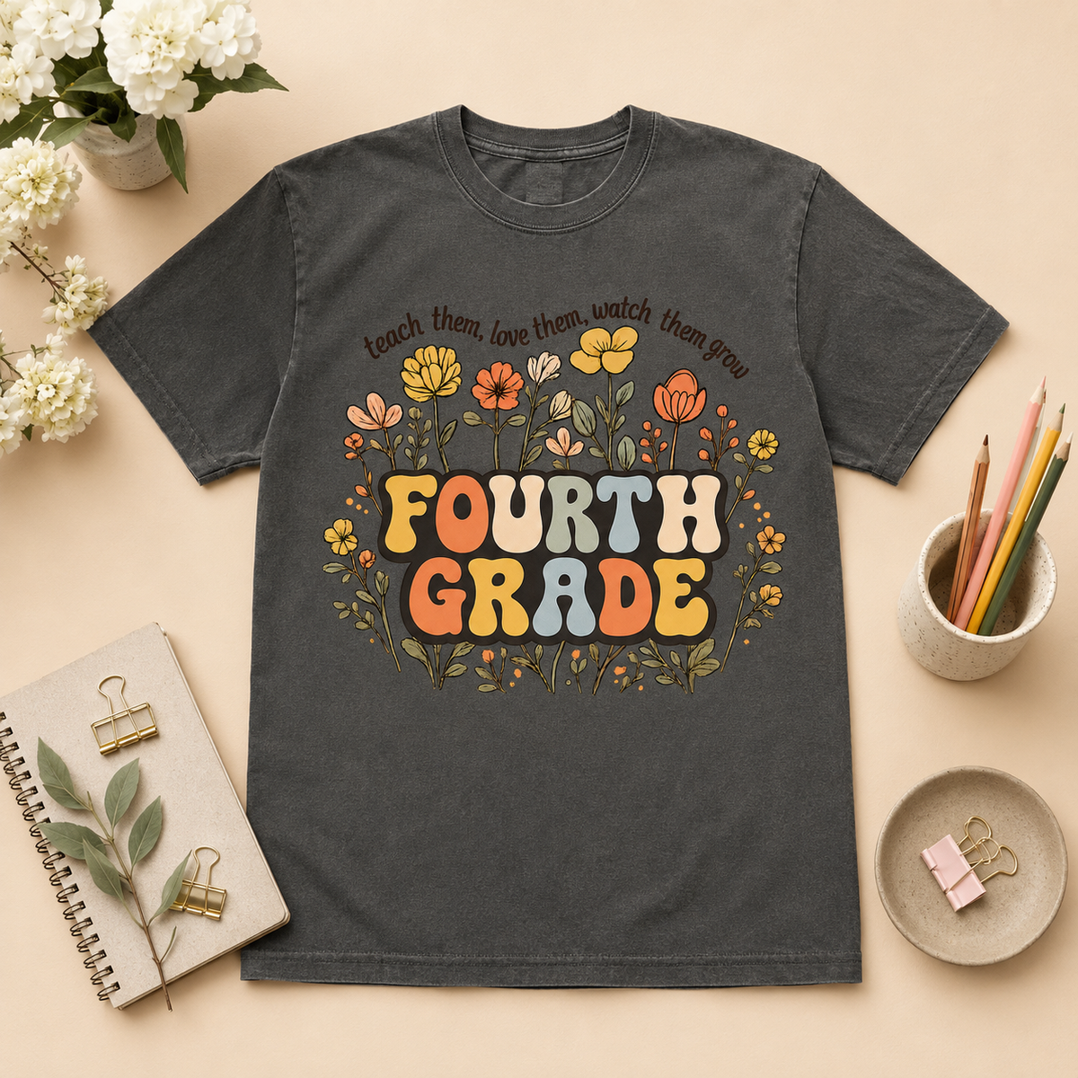 Fourth Grade floral teacher tee in Pepper styled flat lay