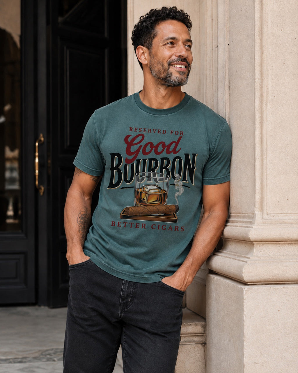 Man wearing Reserved for Good Bourbon Better Cigars statement tee in blue spruce