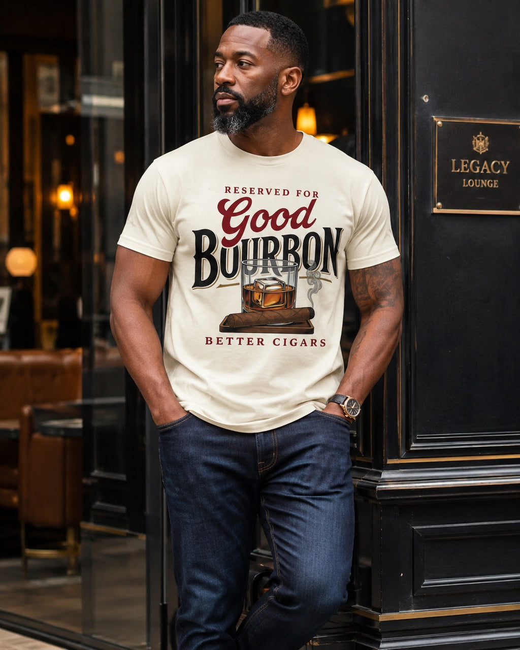 Man wearing Reserved for Good Bourbon Better Cigars statement tee in ivory