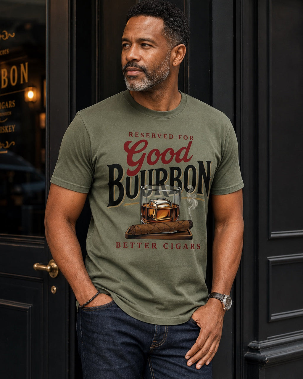 Man wearing Reserved for Good Bourbon Better Cigars statement tee in moss