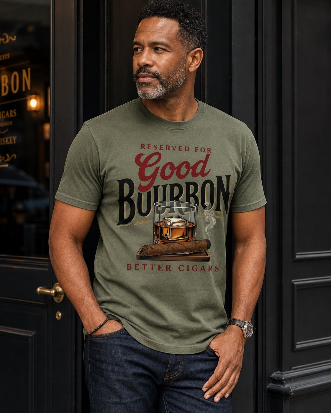 Man wearing Reserved for Good Bourbon Better Cigars statement tee in moss