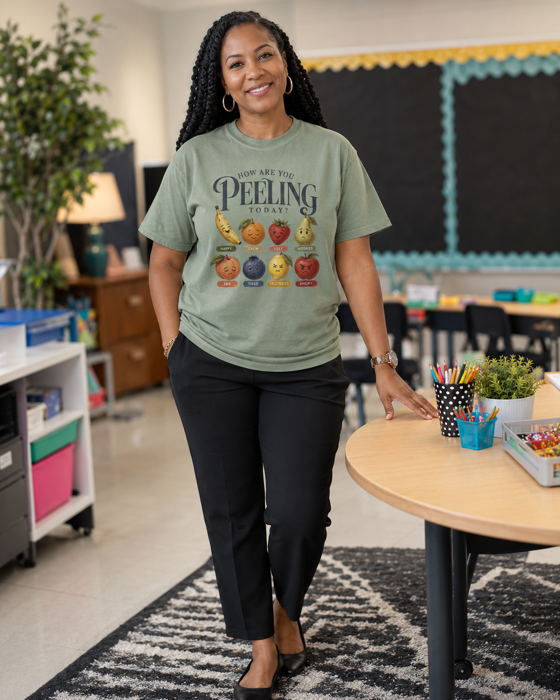 Teacher wearing the How Are You Peeling Today Comfort Colors tee in Sage