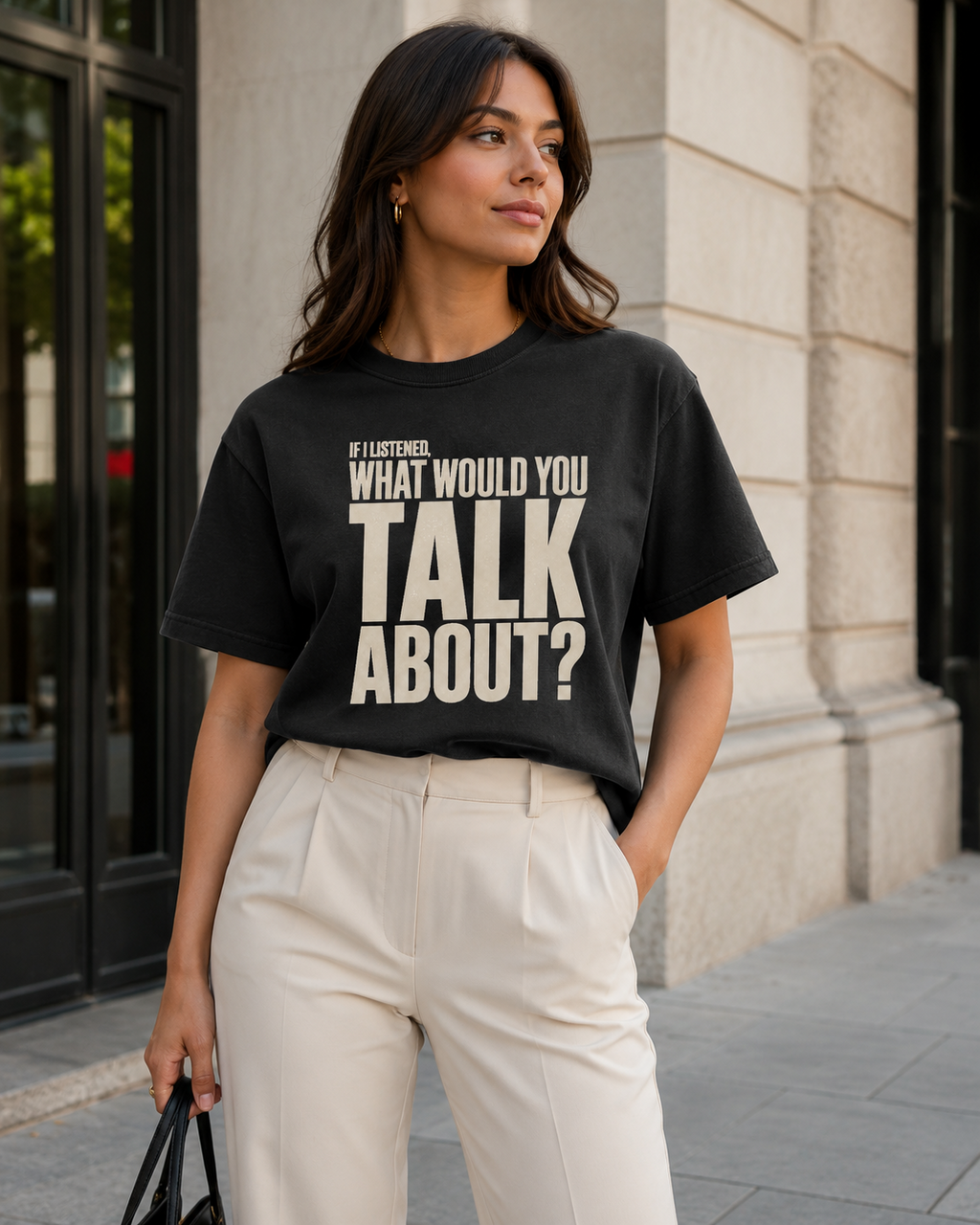Woman styling the If I Listened What Would You Talk About statement tee in black with cream tailored trousers