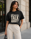 Woman styling the If I Listened What Would You Talk About statement tee in black with cream tailored trousers