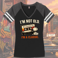 Black and heathered gray District V-neck tee mockup with I'm Not Old, I'm a Classic graphic