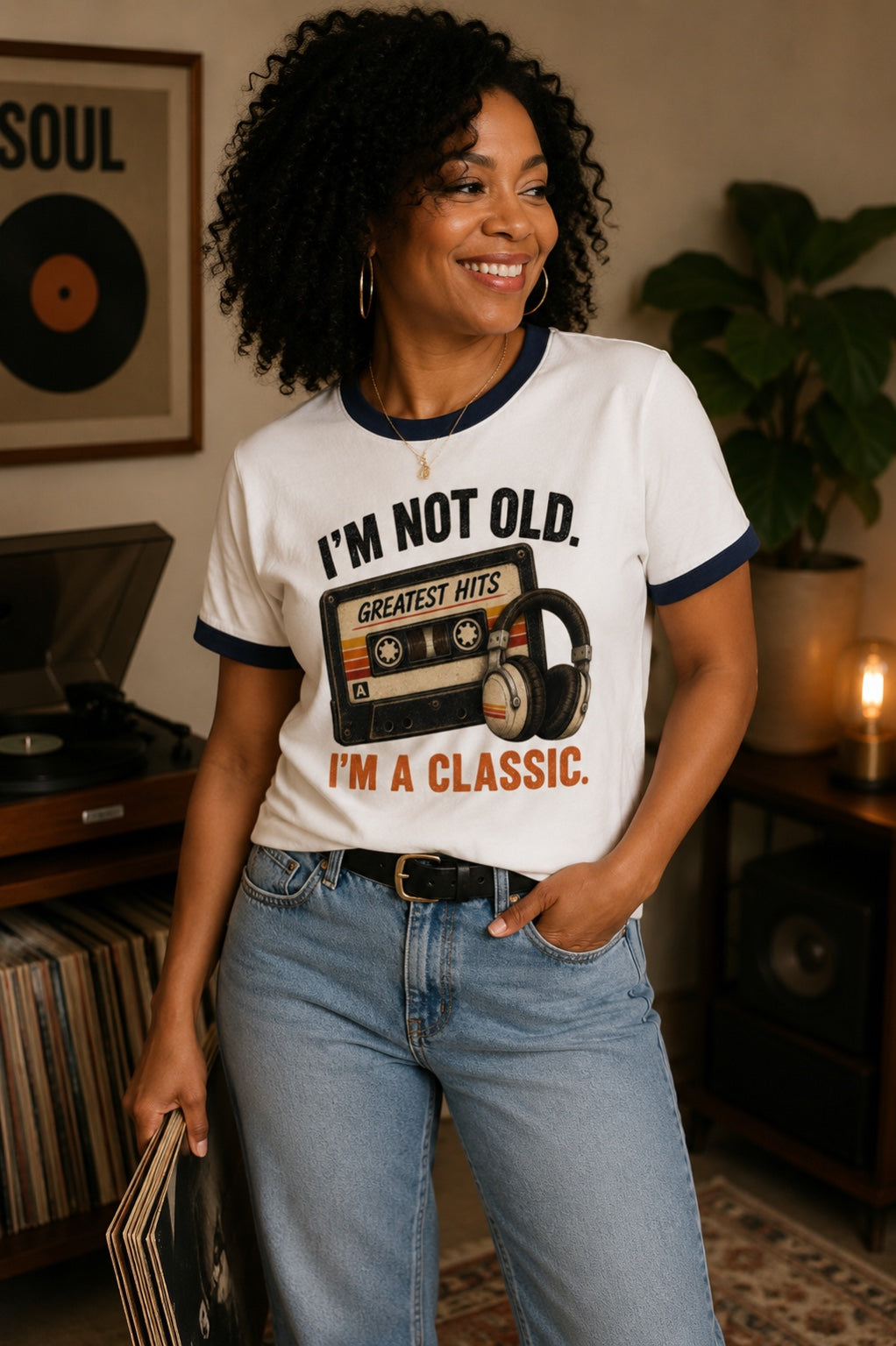 Woman wearing the I'm Not Old, I'm a Classic navy-trim ringer tee in a retro music room