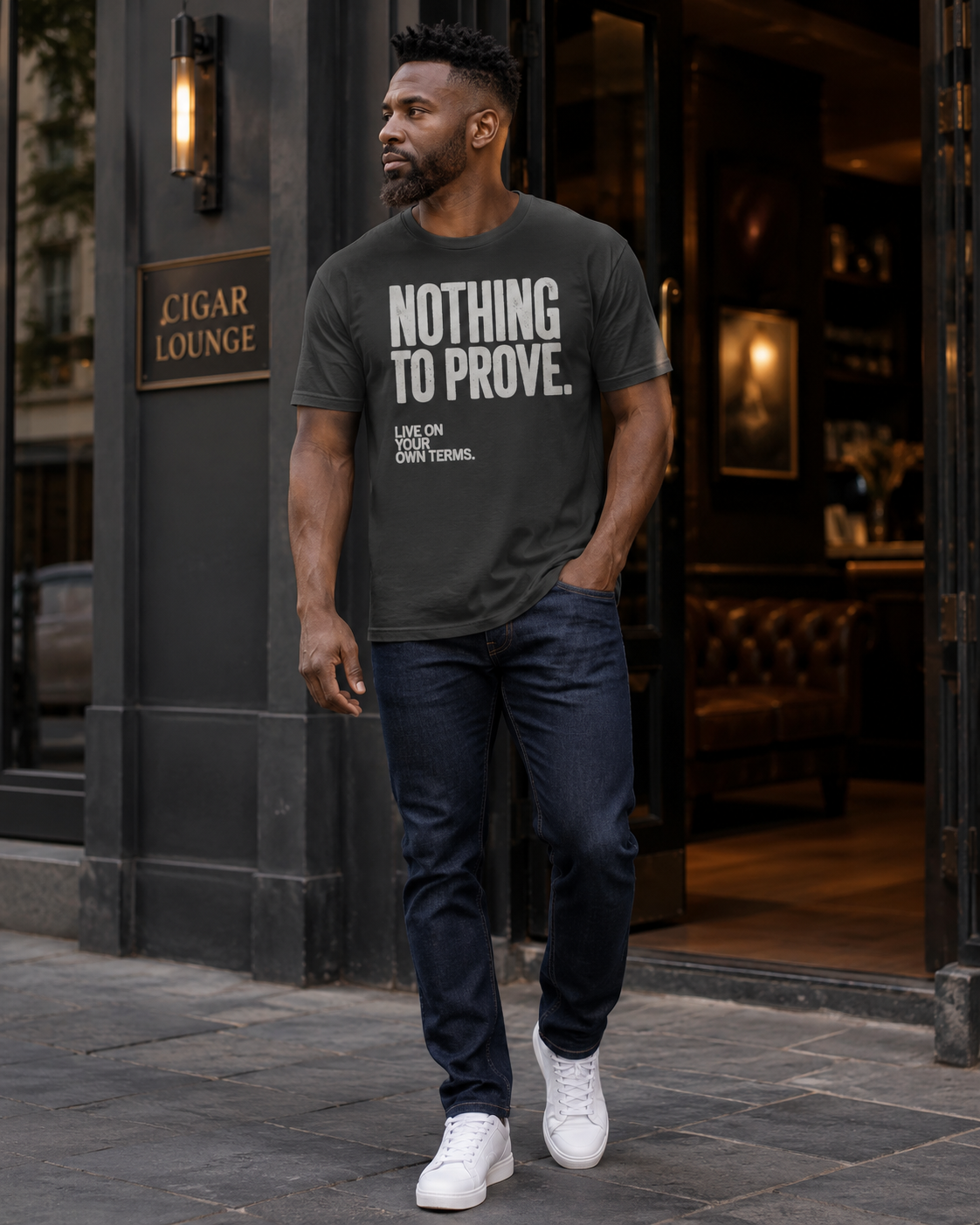 Man wearing black Nothing to Prove men's statement tee outside a cigar lounge