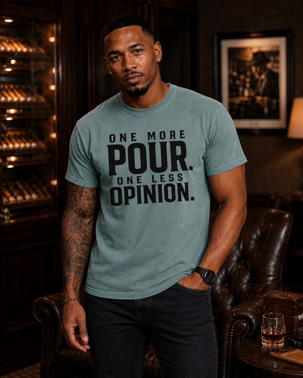 Light-complexion Black man wearing One More Pour One Less Opinion statement tee in Bay
