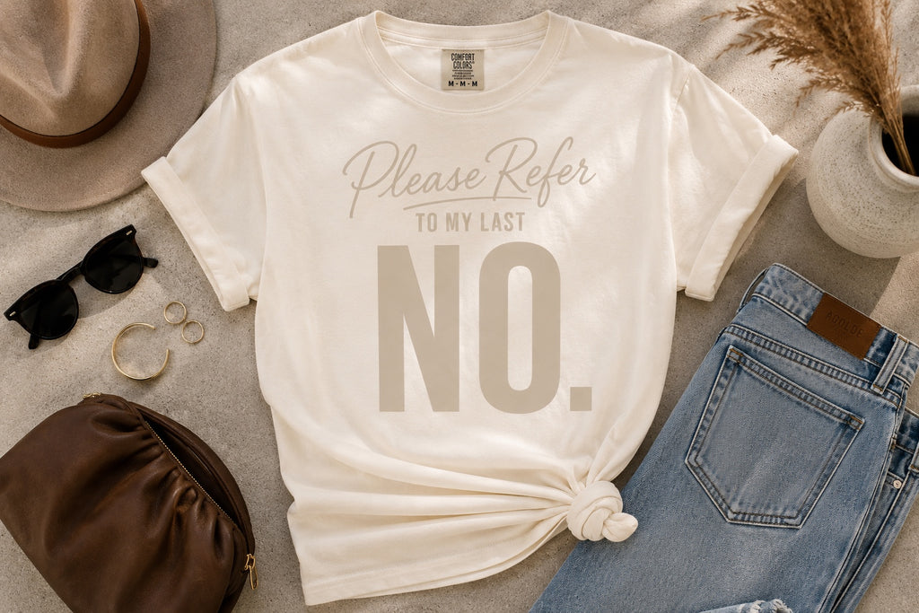 Comfort Colors Ivory Please Refer to My Last No. statement tee styled in an editorial flat lay.