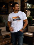 Male model wearing the Pour Decisions Only white graphic tee in a cigar lounge