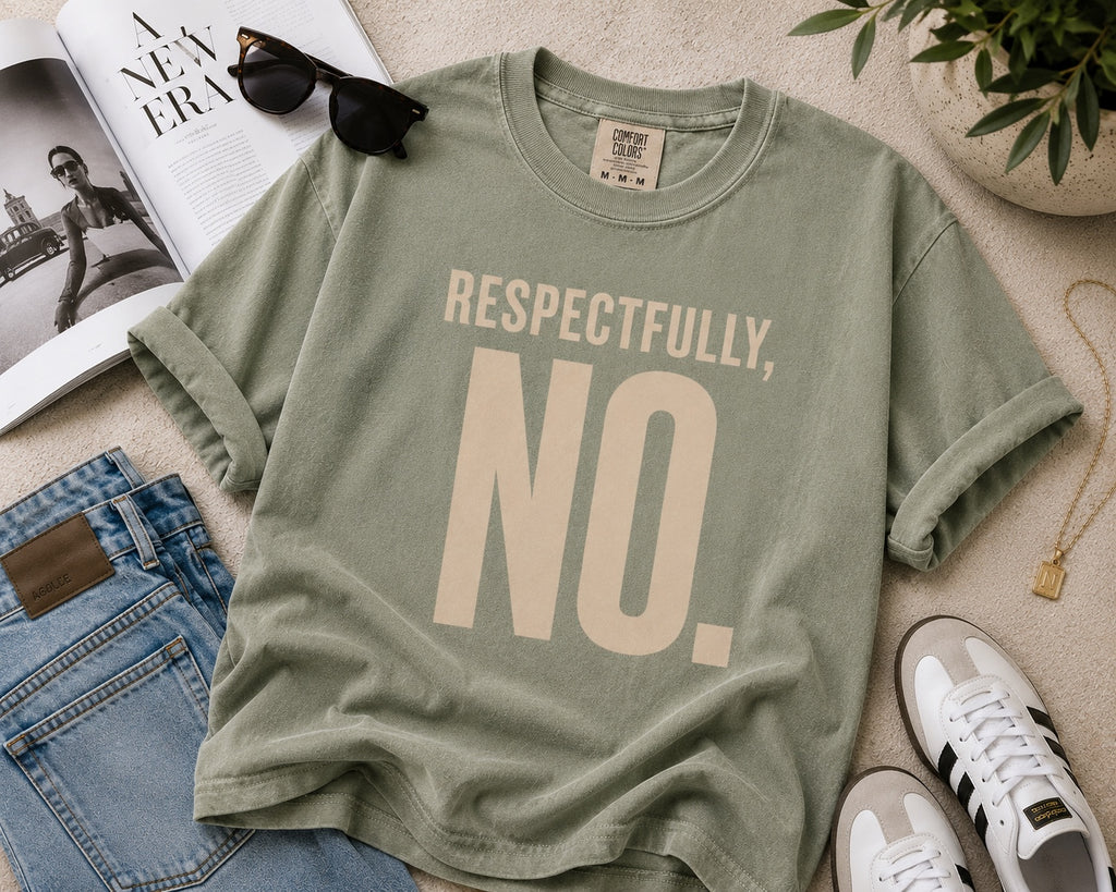 Comfort Colors Sage Respectfully, No. statement tee styled in an editorial flat lay.