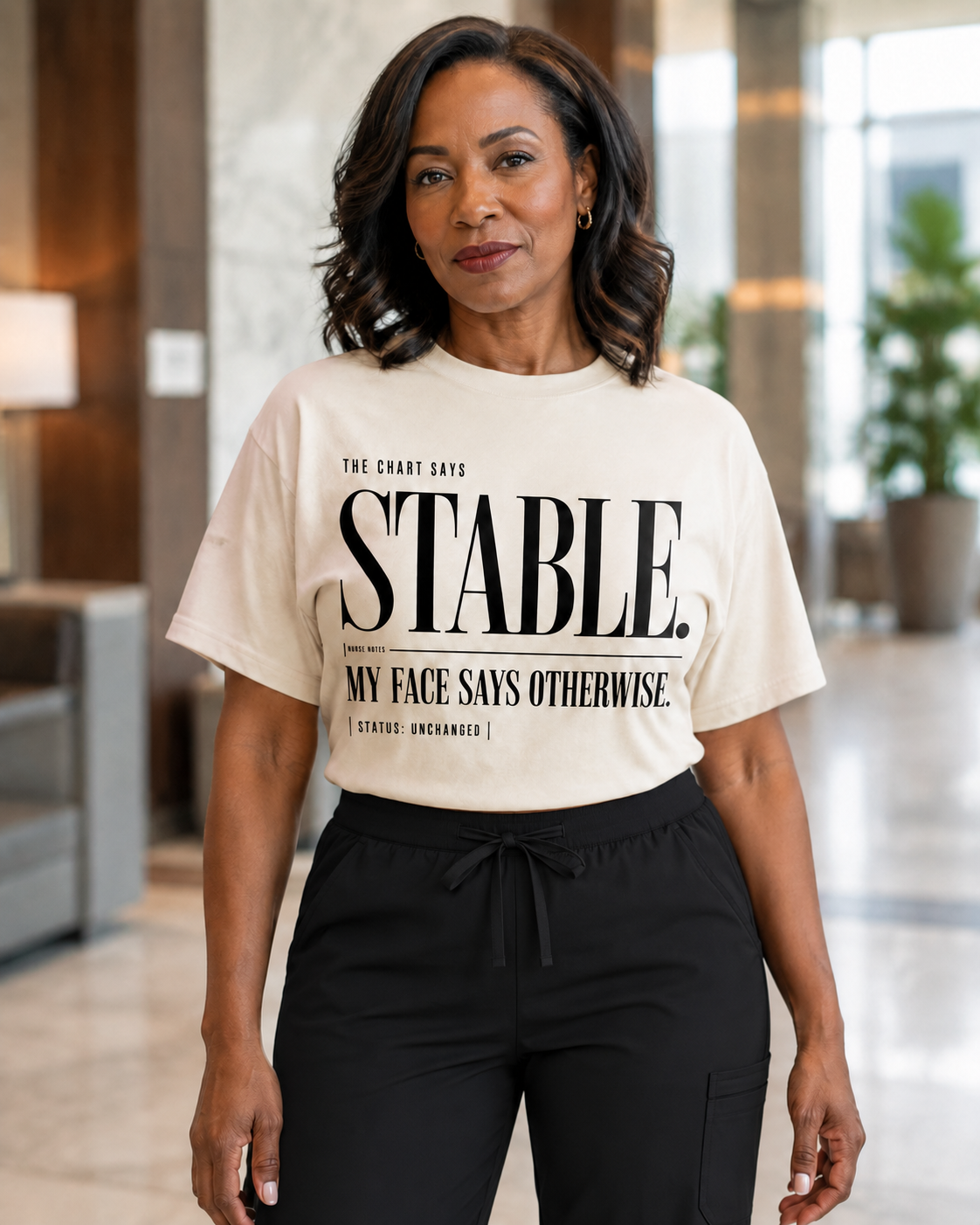 Nurse wearing Ivory Stable My Face Says Otherwise tee in hospital setting