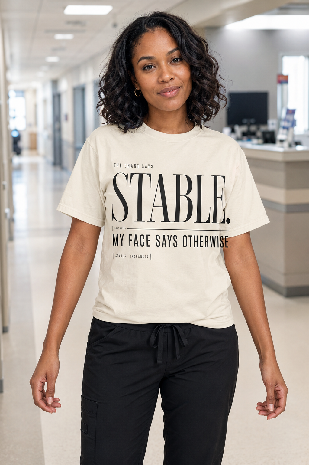 Nurse wearing Ivory Stable My Face Says Otherwise tee with black scrub pants