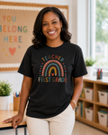 First Grade rainbow teacher tee in Black Comfort Colors lifestyle mockup