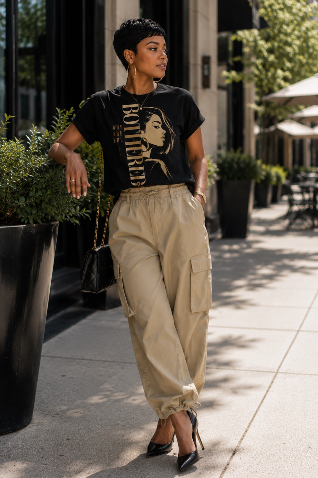Why Are You Bothered illustrated black statement tee in a full-length lifestyle look